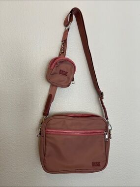 Bxsie Nomadic Book Crossbody Bag in color Rosy